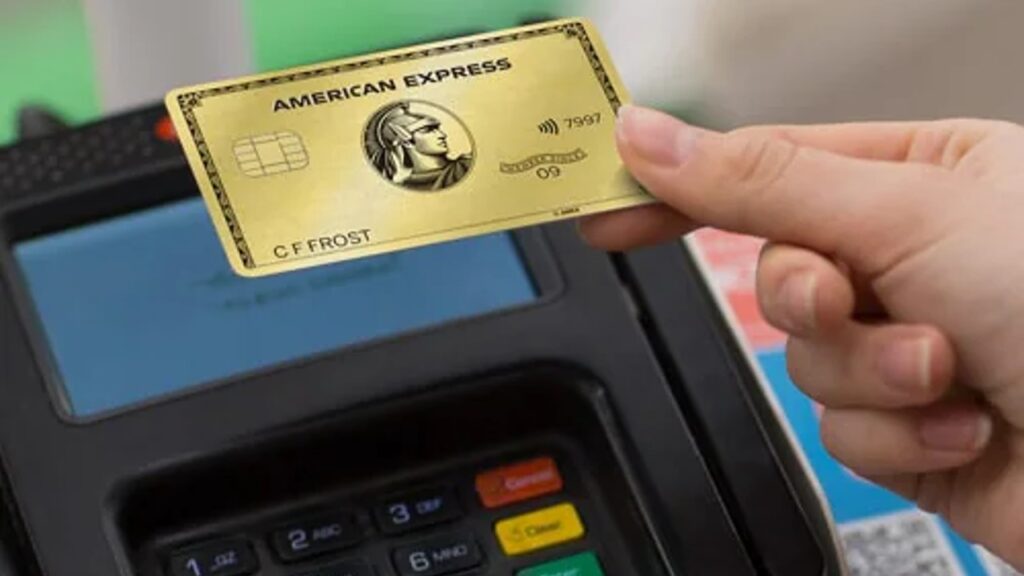 Person using Amex Gold to pay